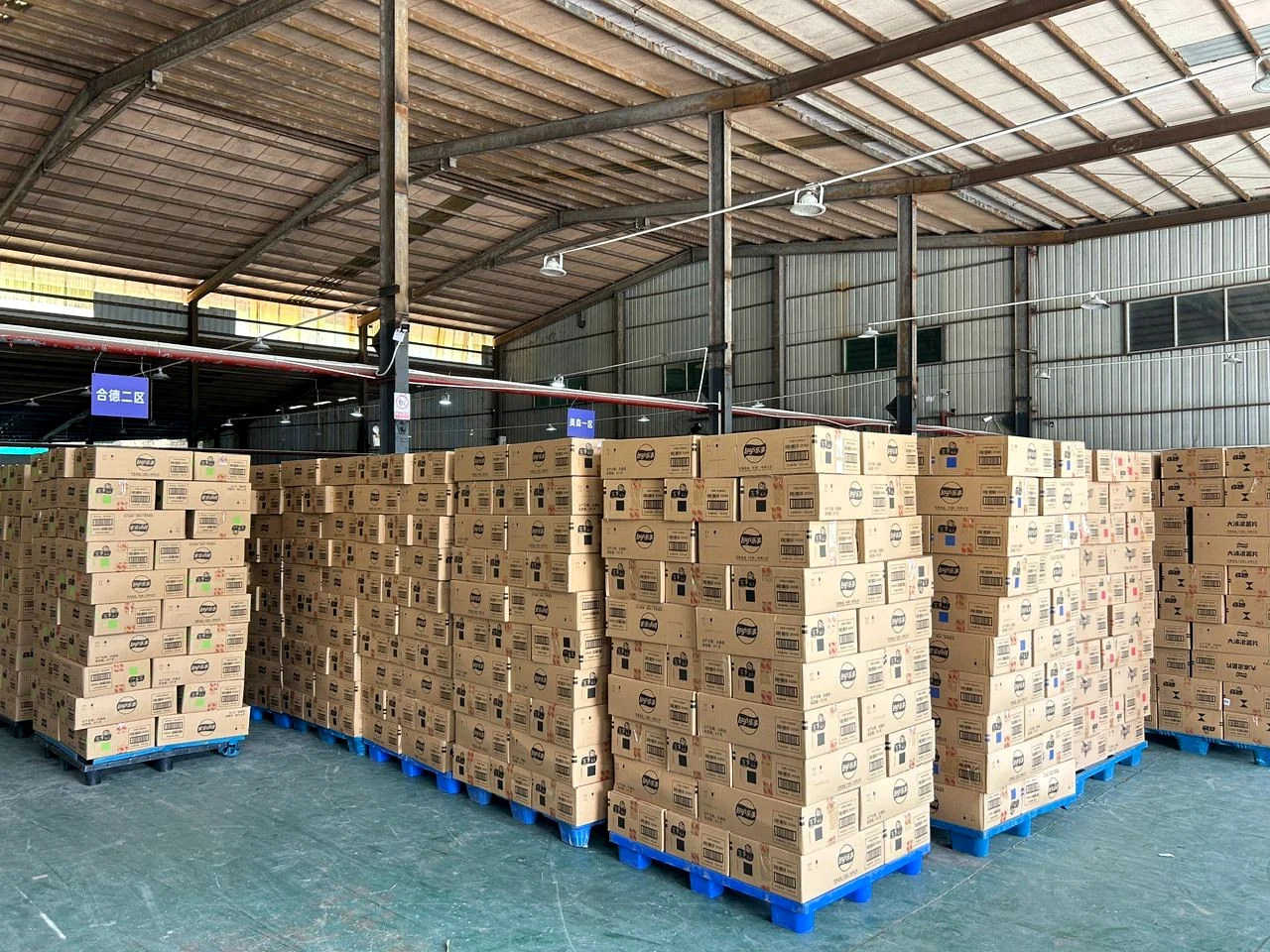 Container being loaded at warehouse